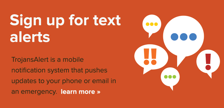 Graphic with a vermillion background with the words "Sign up for text alerts." Next to the words are speech bubbles that have exclamation points and ellipses.